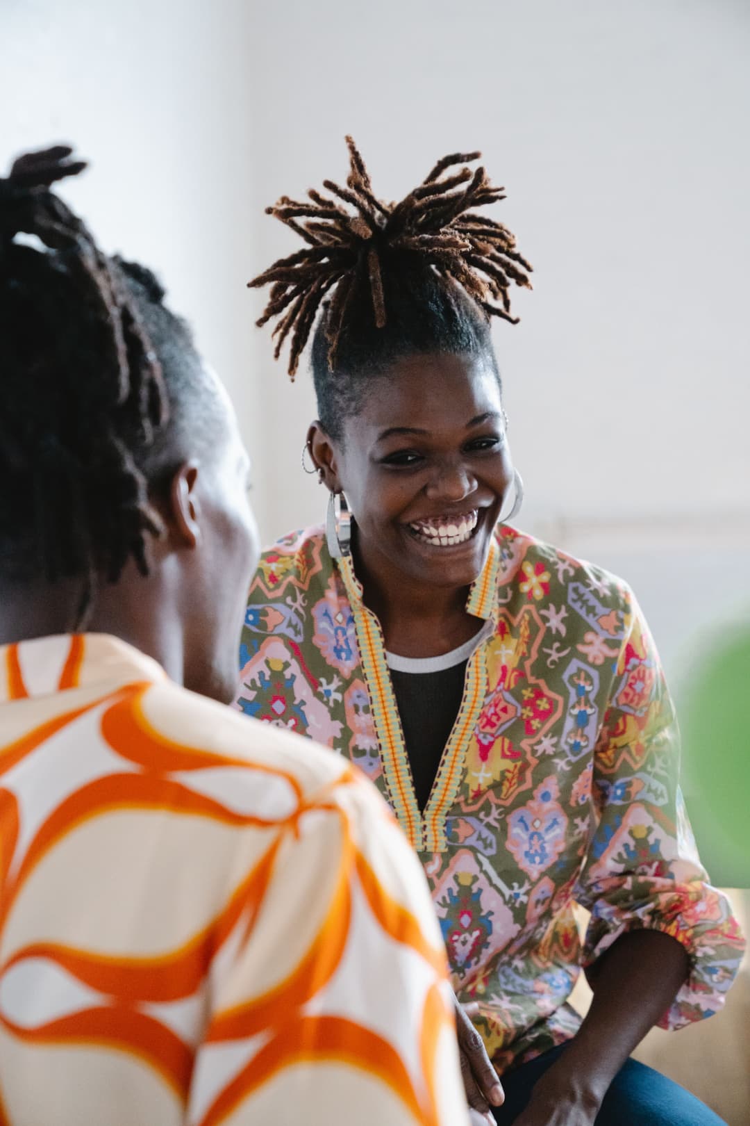 African tutor guiding a functional conversation Twi lesson